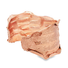 Load image into Gallery viewer, a copper-colored bracelet with a unique, textured design.
