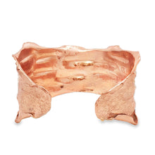 Load image into Gallery viewer, A copper-colored bracelet with a textured, organic design.