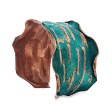 Load image into Gallery viewer, a piece of art that is a combination of copper and turquoise colors, with a textured and weathered appearance.
