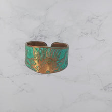 Load and play video in Gallery viewer, Verdigris Sunflower Ring - Rustic Copper Band With Etched Sunflower Motif
